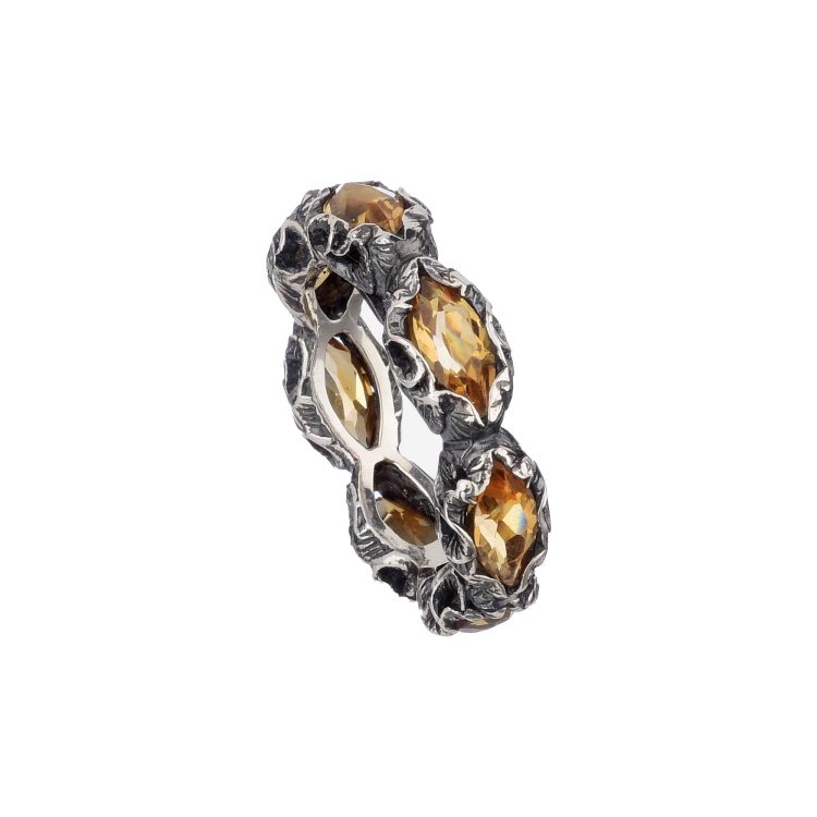 ETERNITY RING WITH SEVEN MULTI-FACETED CUT STONES - Image 2