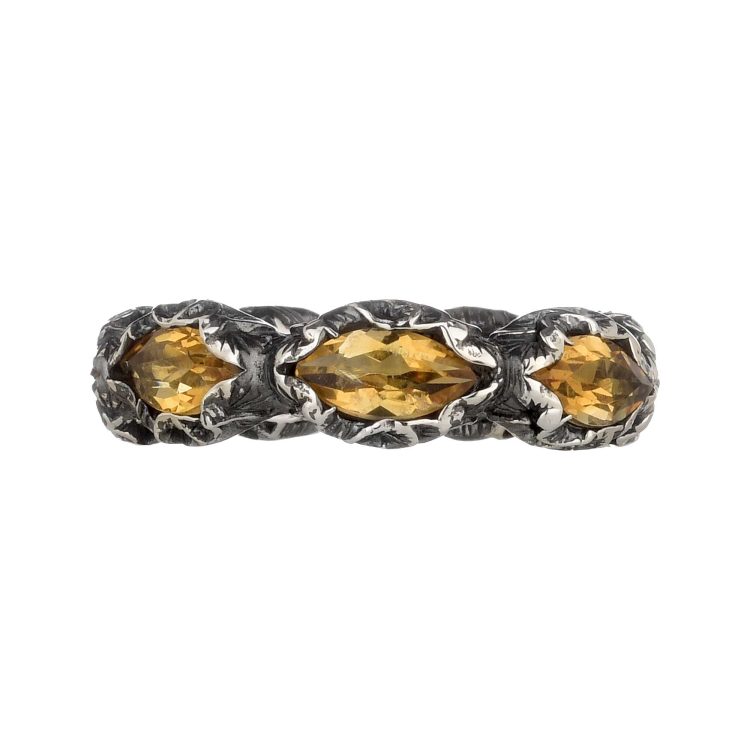 ETERNITY RING WITH SEVEN MULTI-FACETED CUT STONES - Image 3