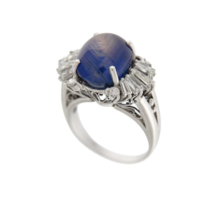 PLATINUM RING WITH 15.78 ct CABOCHON SAPPHIRE AND 50’s DIAMONDS